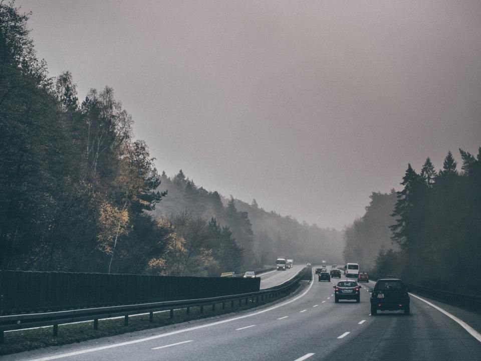 An early morning highway in low mist, the start of a collection run across North Carolina